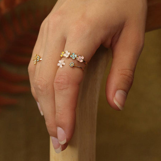 Gold plated mixed enamel and crystal flowers ring