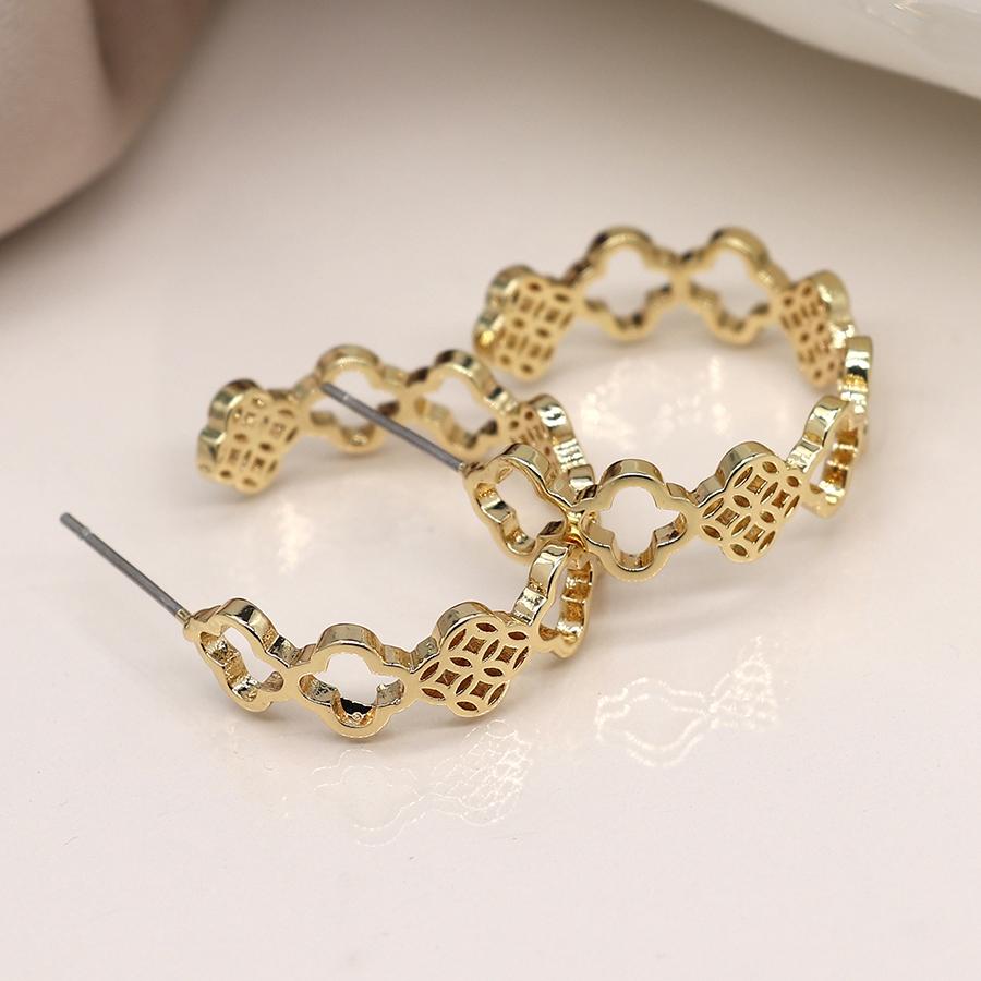 Golden multi quatrefoil hoop earrings