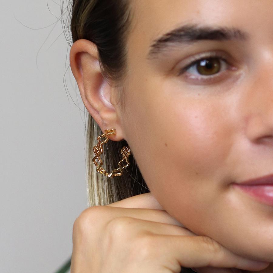 Golden multi quatrefoil hoop earrings
