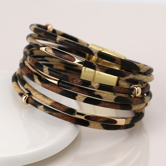 Multistrand leopard print and golden element bracelet