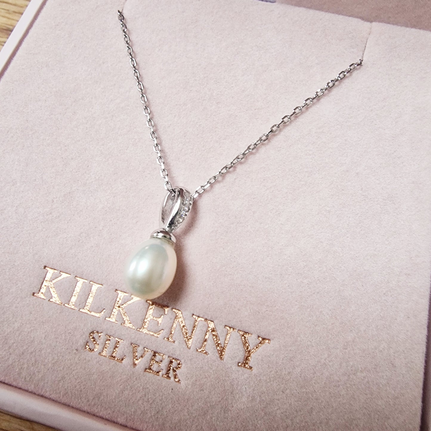 Silver pearl drop necklace with stones