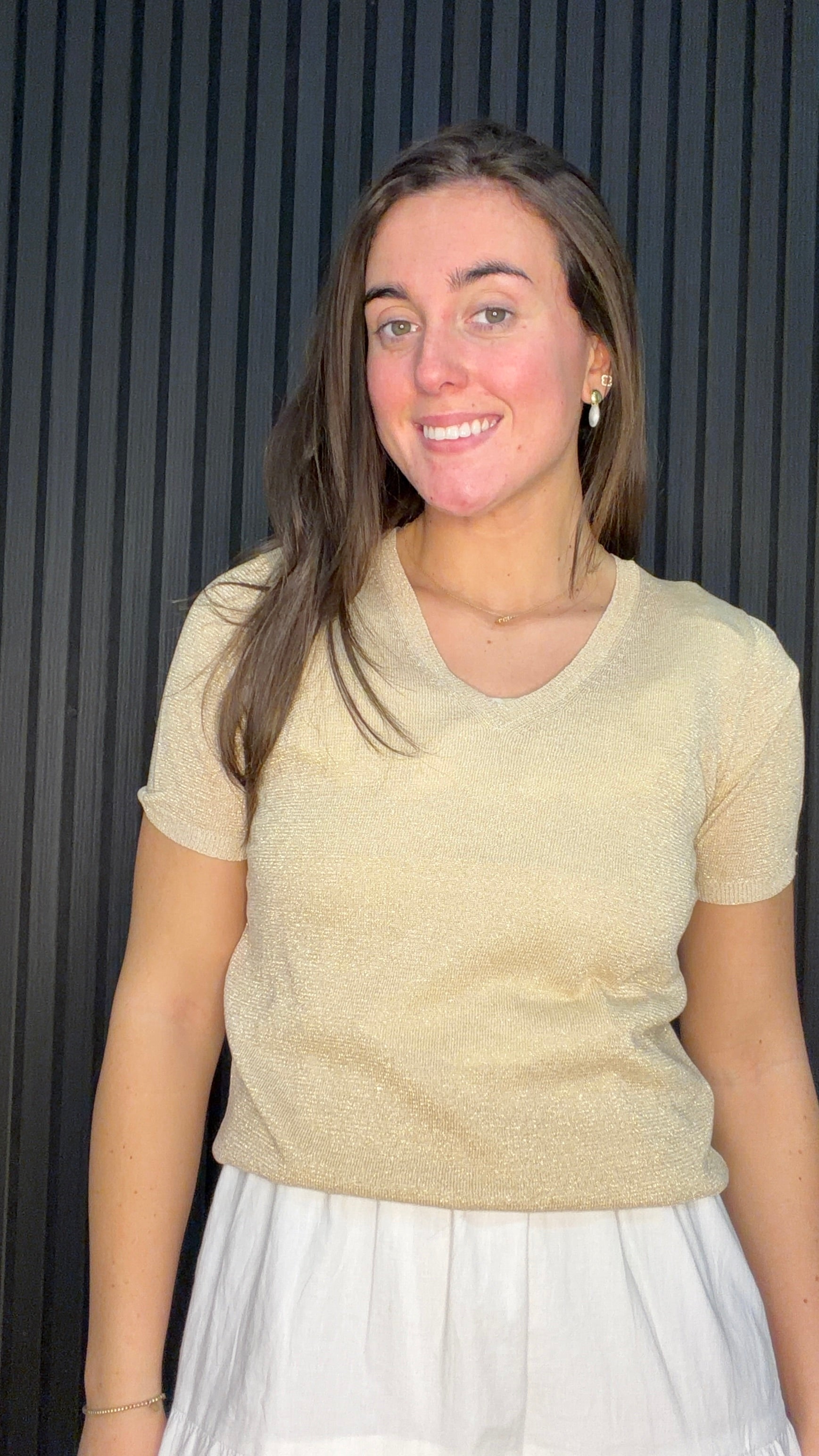 Model wearing the Bernie Gold Glitter Knit Top in Frosted Almond with a subtle shimmer finish.