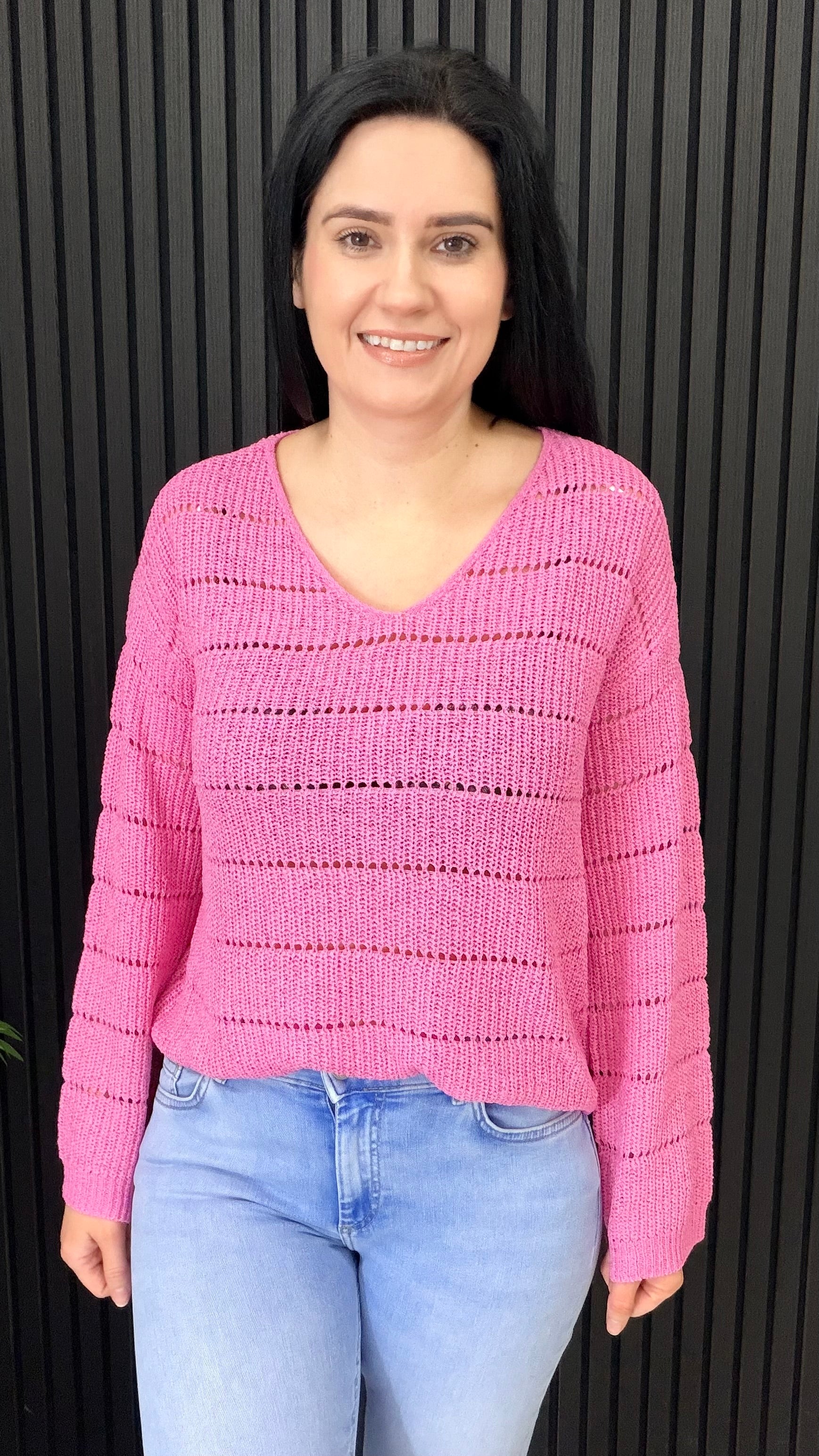 Pamela flat knit v-neck jumper in pink styled with denim