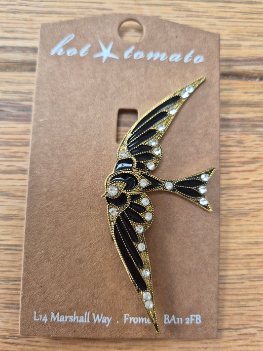 Swallow flight Antique gold blue enamel brooch