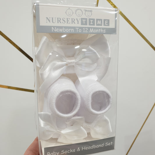 White baby socks and headband