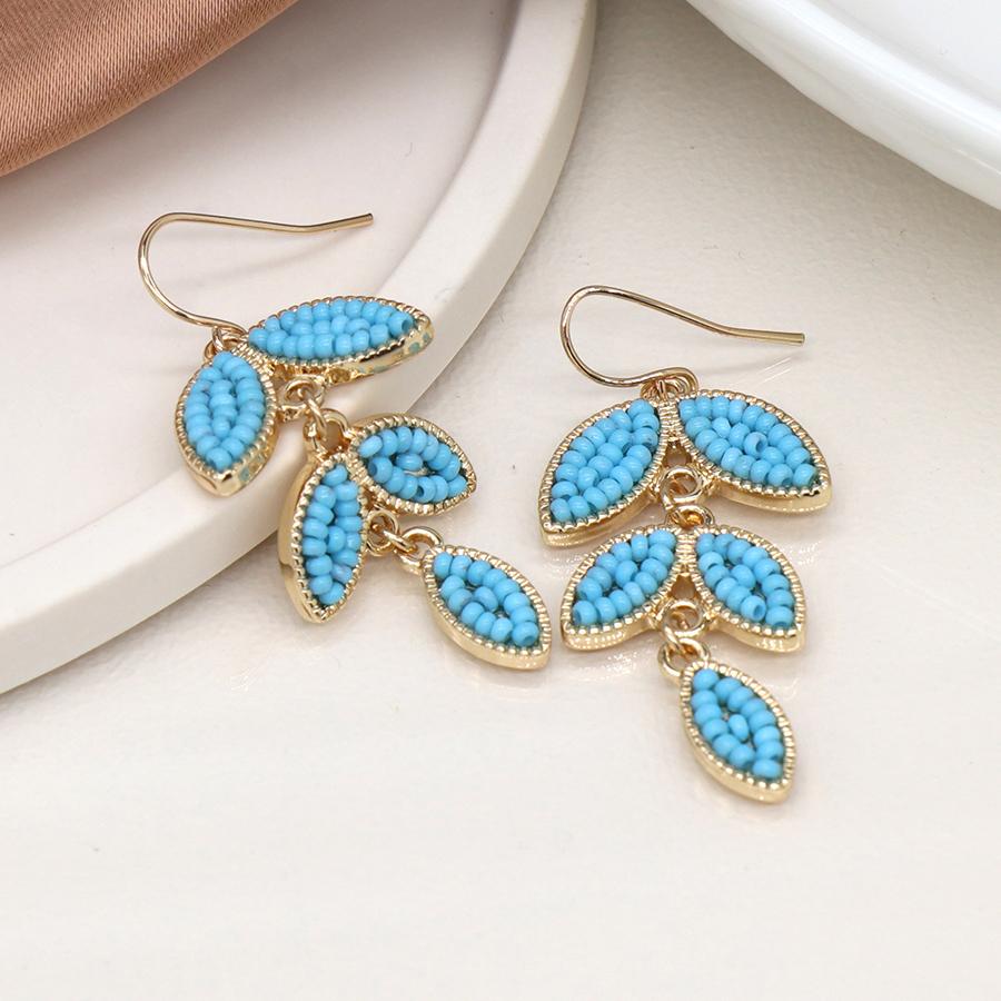 Golden and blue bead leaf drop earrings