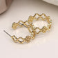 Golden multi quatrefoil hoop earrings