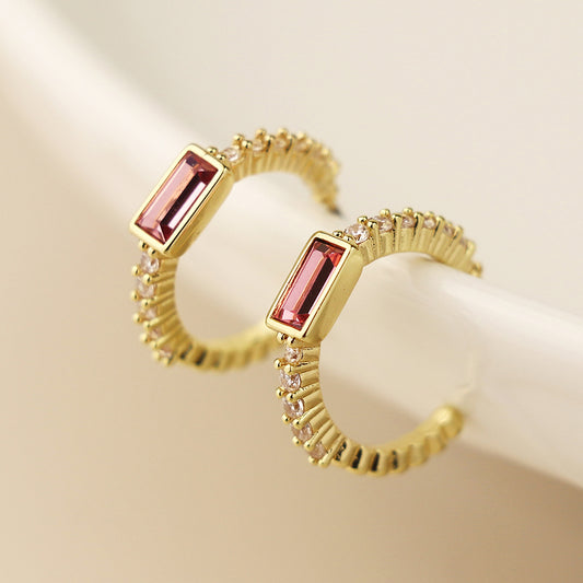 Golden hoop stud earrings with pink and clear crystals