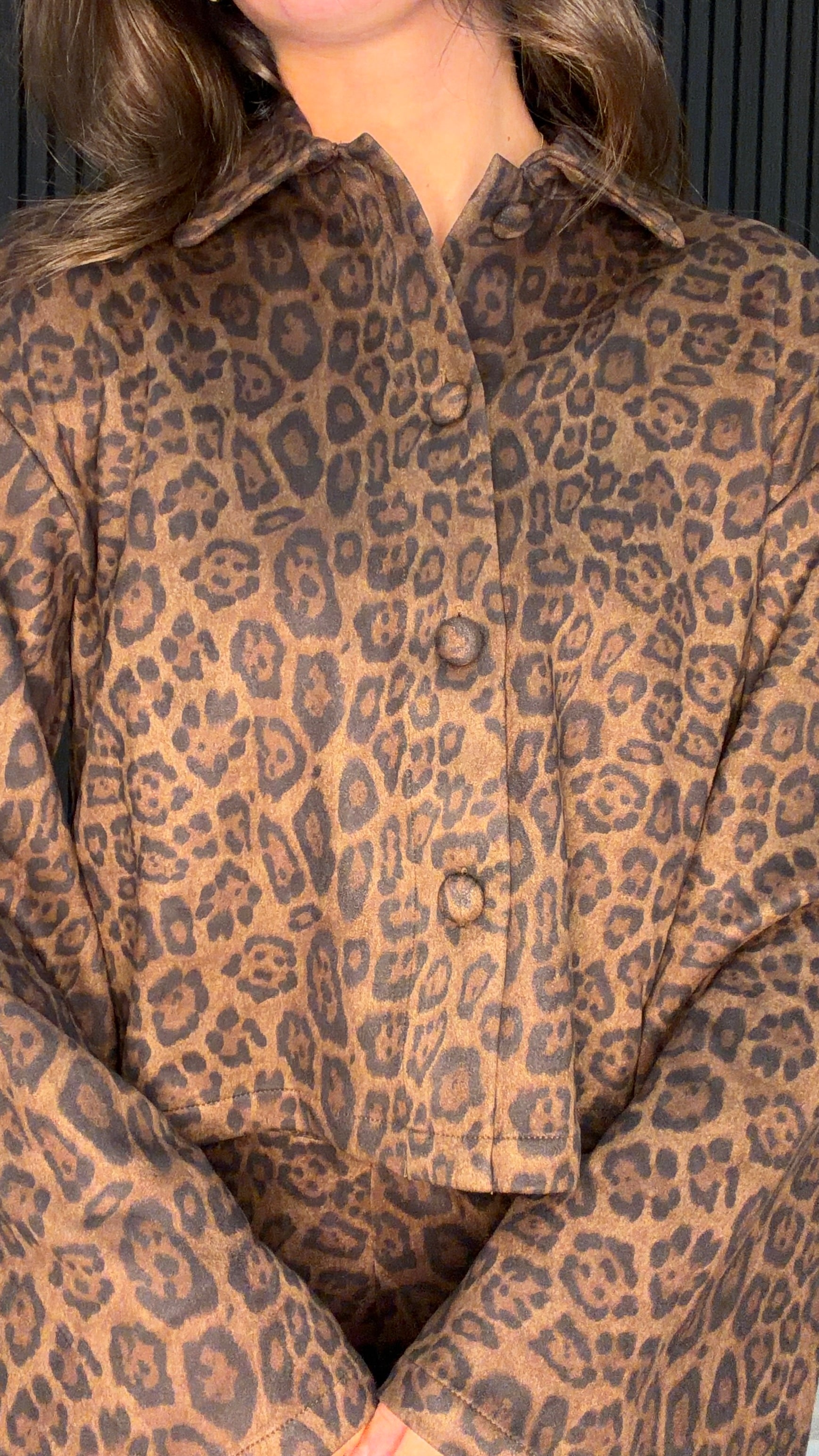 Model wearing the Vicky Leopard Print Jacket in Coffee Bean with a matching leopard print mini skirt.