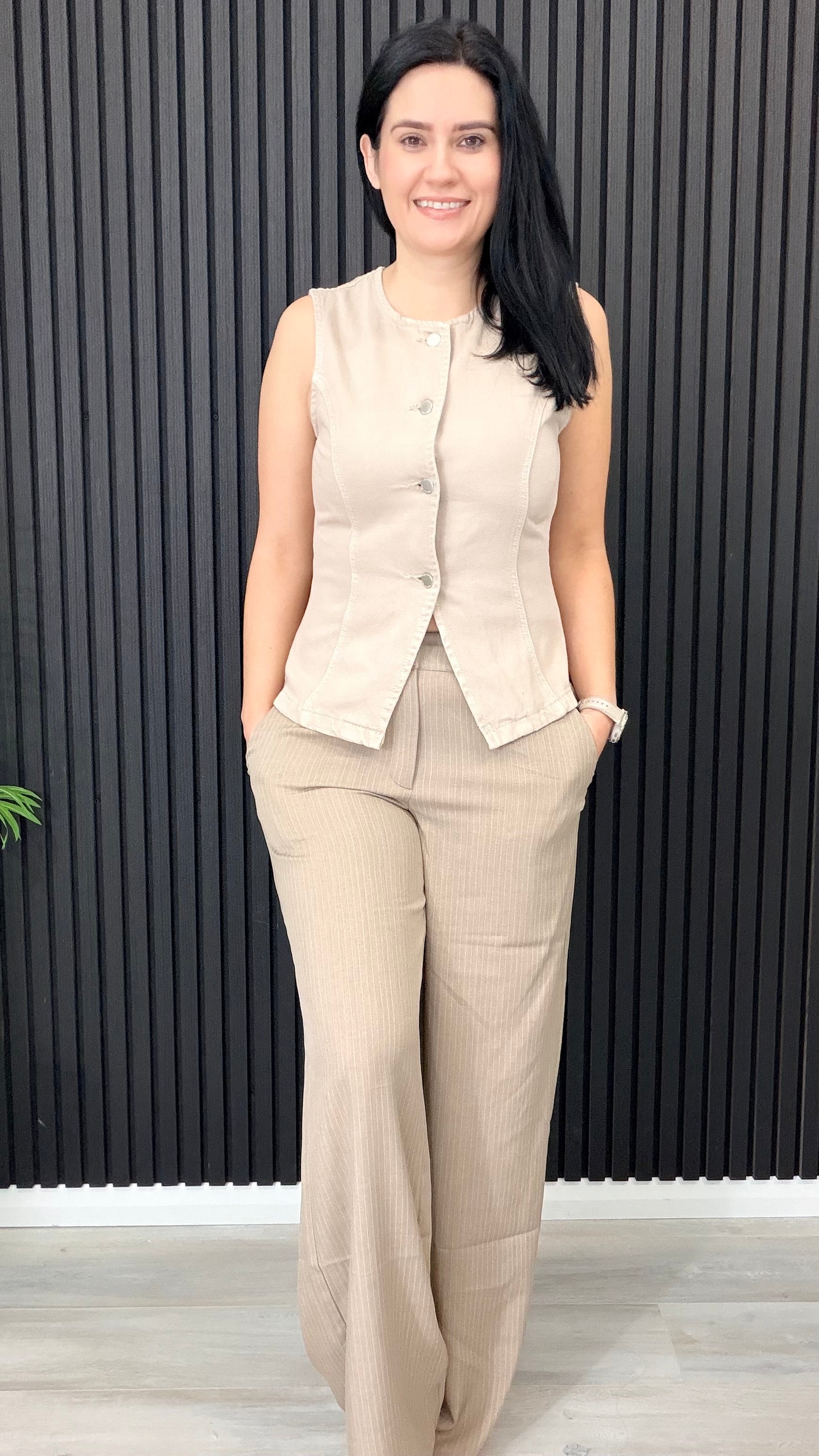 Beverly button front waistcoat worn as a layered outfit