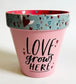 Love Grows here plant pot