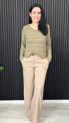 Pamela lightweight flat knit jumper worn with neutral trous