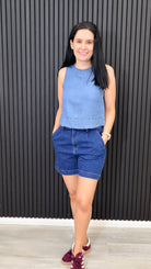 Women’s high waisted dark blue denim shorts with pockets, mid-thigh length casual summer shorts