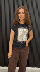 Shop the Tanya Graphic T-Shirt in Black Abstract Leo, featuring a statement neutral graphic, round neck and easy rolled sleeves.