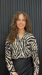Women’s relaxed zebra print shirt in oatmeal and sassafras with a button front, classic collar and long sleeves.