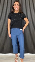 Hester tee styled with blue cropped trousers on model