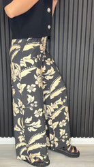 Troya Palazzo Trousers in crème floral print — wide leg co-ord trousers front vie