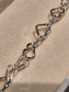 SILVER FINE INTERLOCKING HEART BRACELET L3291