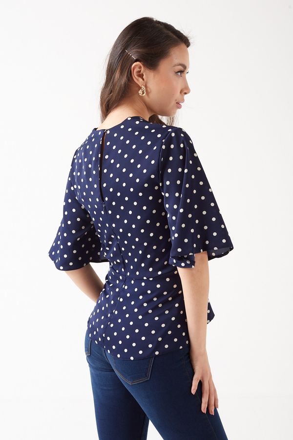 Polka dot front tie top deals